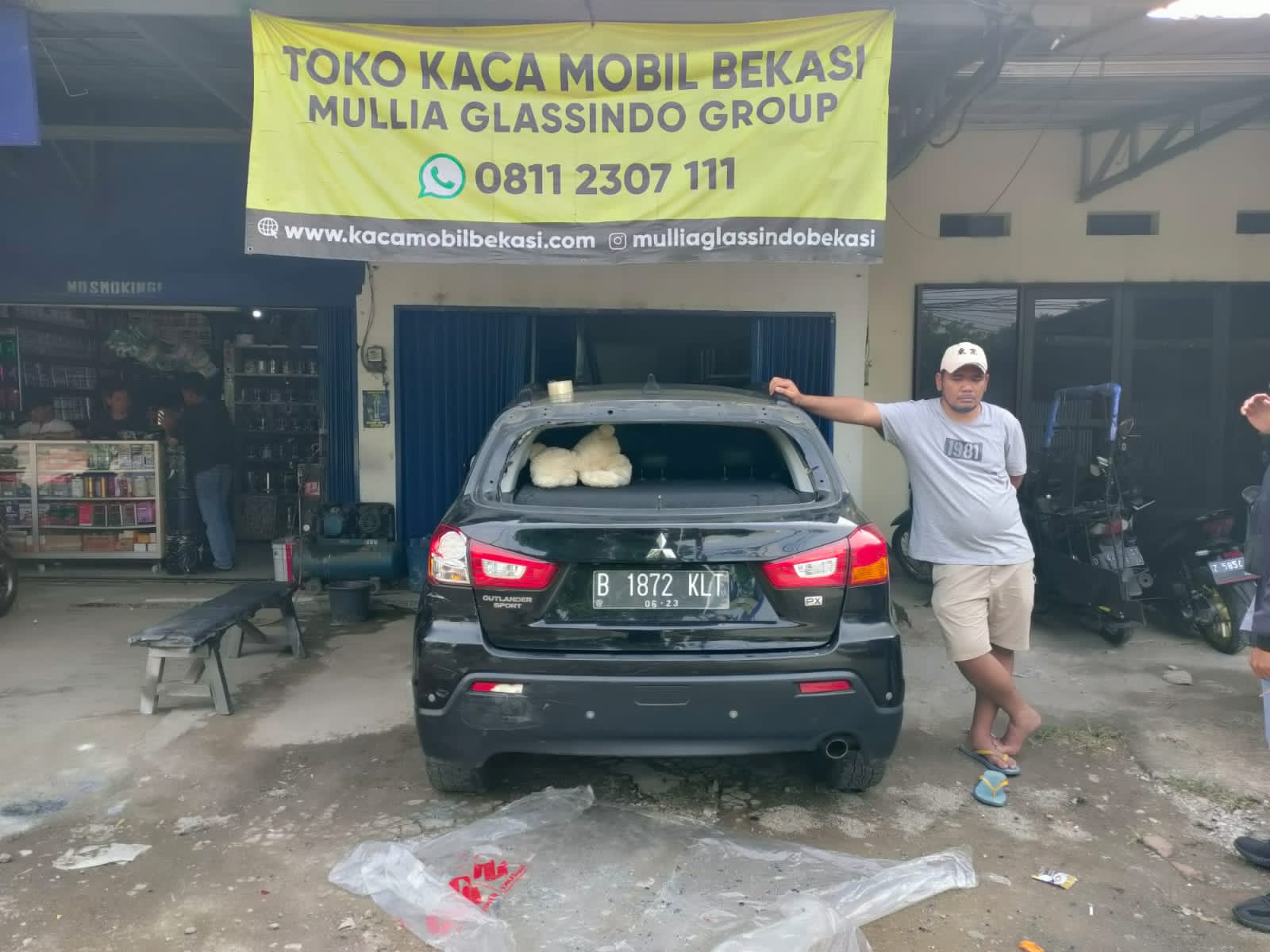 Toko Kaca Belakang Mitsubishi Outlander Murah di Bekasi Cikarang Bergaransi